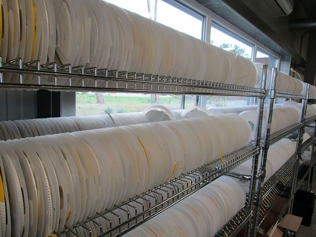 Stock of components on reels.